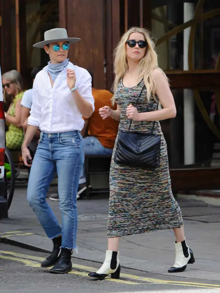 amber heard walks with her gf after 13 million libel trial with johnny depp 1