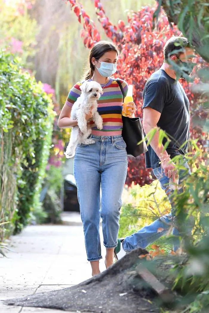ana de armas in a rainbow striped top with ben affleck outside her home 2