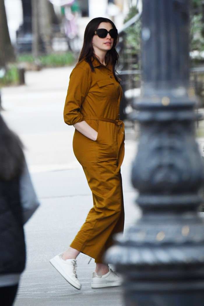 Anne Hathaway in Mustard Color Jumpsuit Out in NYC