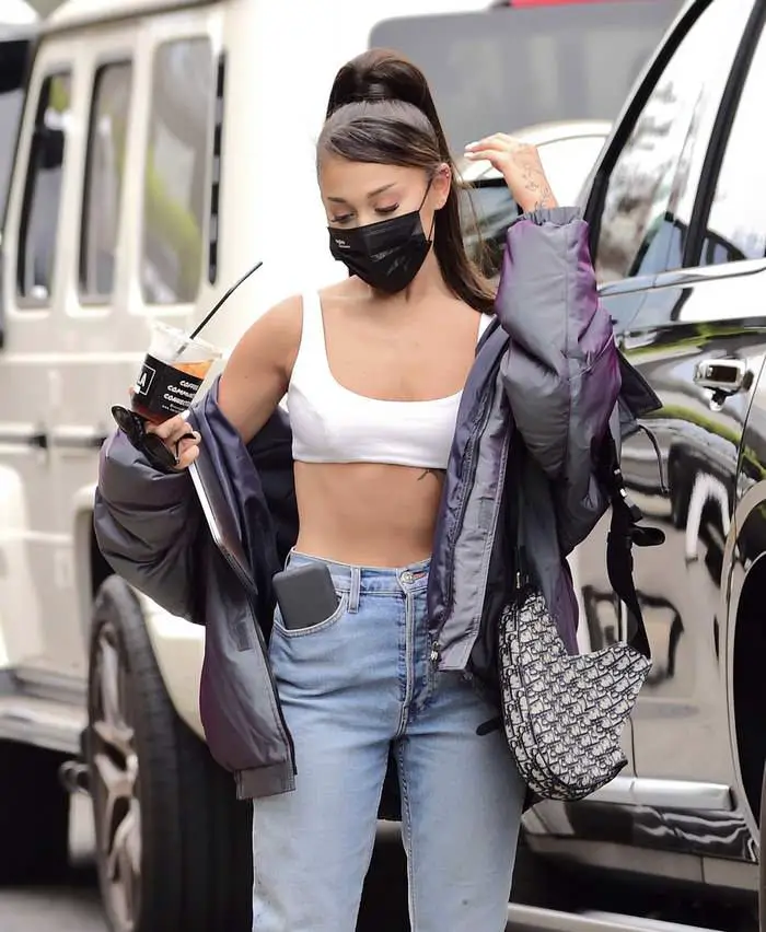 Ariana Grande Flashes her Toned Abs as she Arrives in the Recording Studio