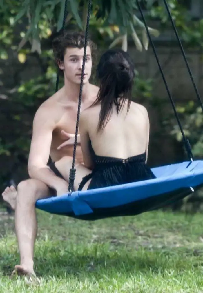 camila cabello and shawn mendes cuddle up on a swing 3