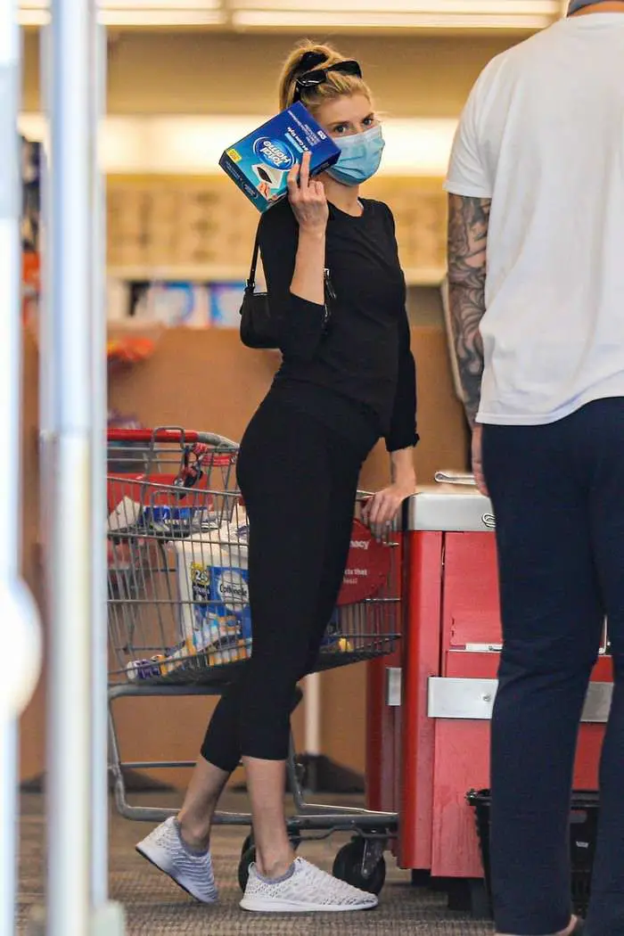 Charlotte McKinney in a Black Outfit During a Masked Pharmacy Run