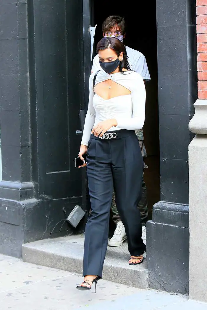 dua lipa in a chic white cut out bodysuit leaves a studio in ny 2