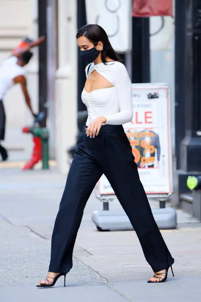 dua lipa in a chic white cut out bodysuit leaves a studio in ny 4