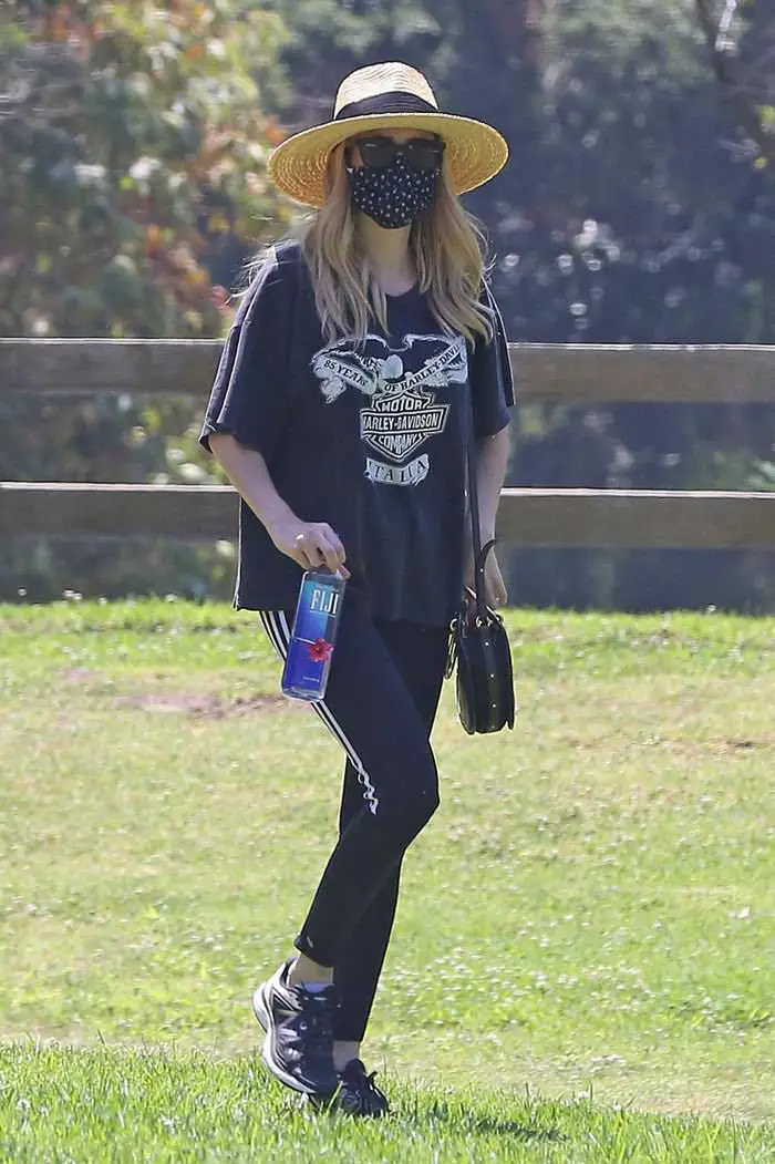 emma roberts covers up her baby bump in an oversized t shirt 2