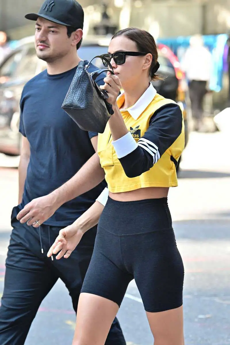 Irina Shayk In Bicycle Tights And Yellow Sport Top In New