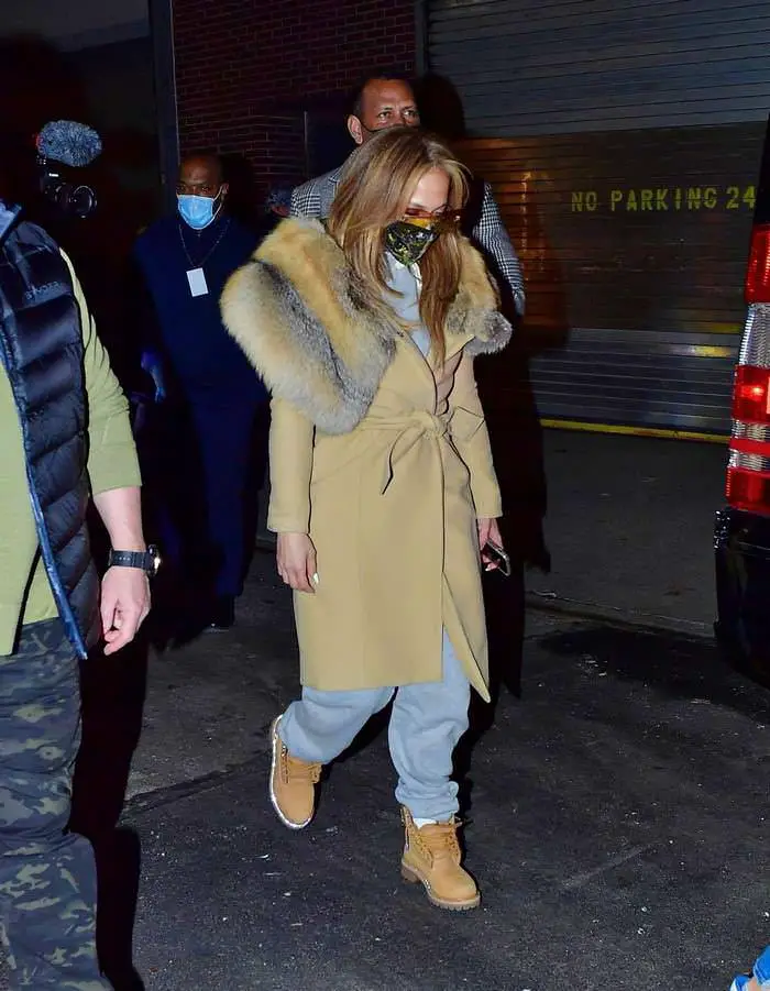 jennifer lopez bundles up in a fur trimmed coat as she leaving a studio in ny 2