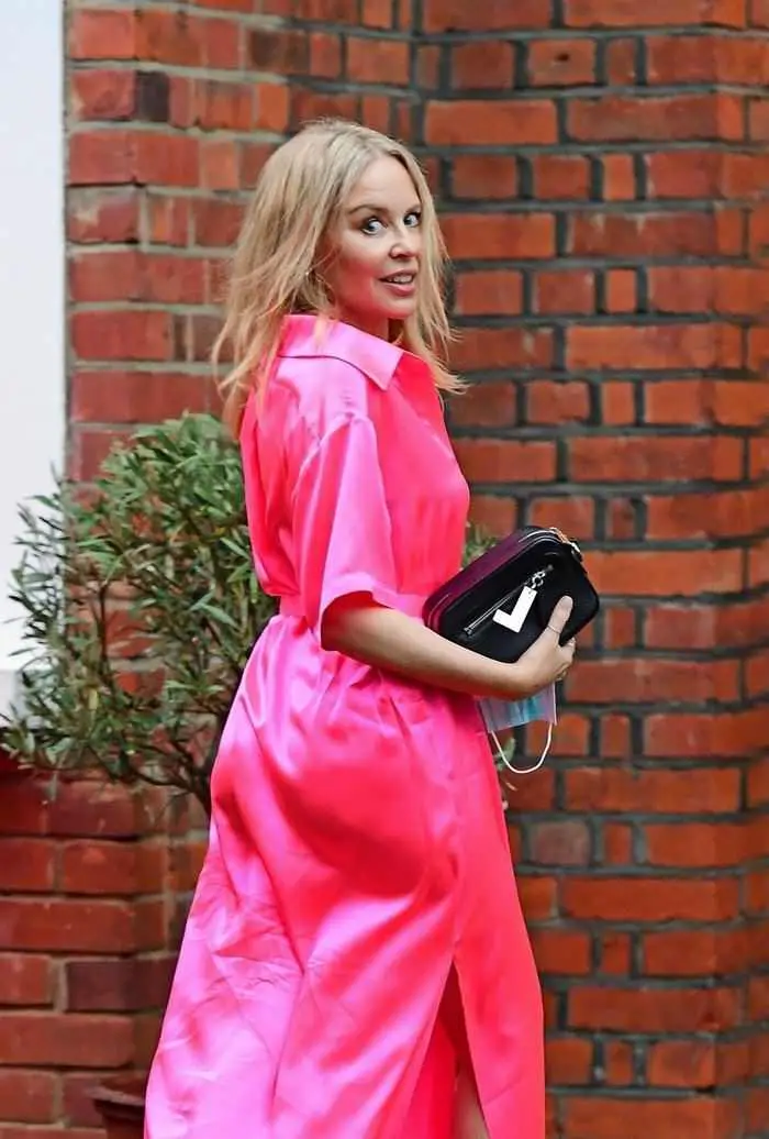 Kylie Minogue Looks Spectacular in a Shiny Pink Dress as she Heads Out for Dinner