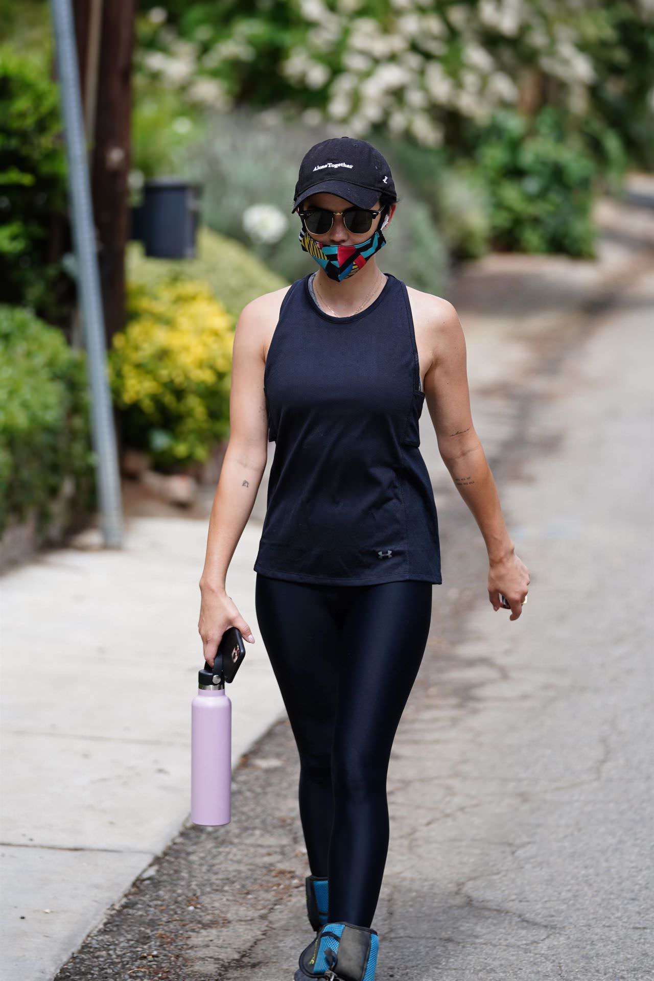 Lucy Hale Rocks a Sporty Figure in Leggings and Tank Top