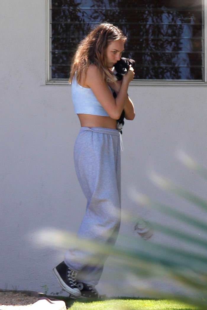maddie ziegler cuddles with a cute puppy in palm springs 3