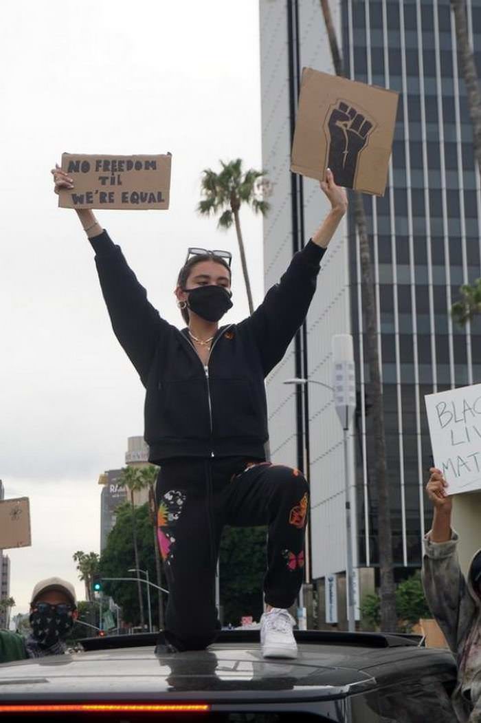 madison beer protests with a sign no freedom til we re equal 1