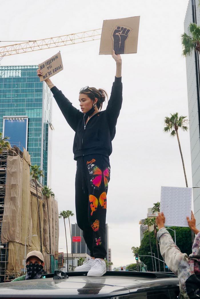 madison beer protests with a sign no freedom til we re equal 3
