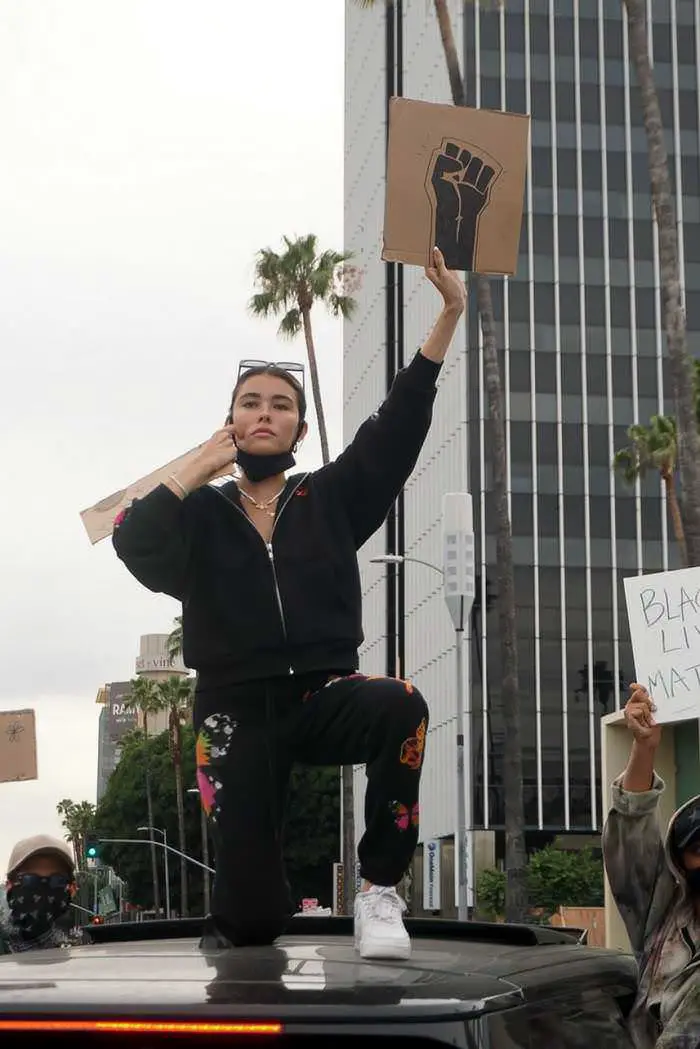 madison beer protests with a sign no freedom til we re equal 4