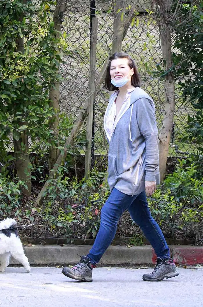 milla jovovich cuts a relaxed look as she takes her dogs for a walk 3