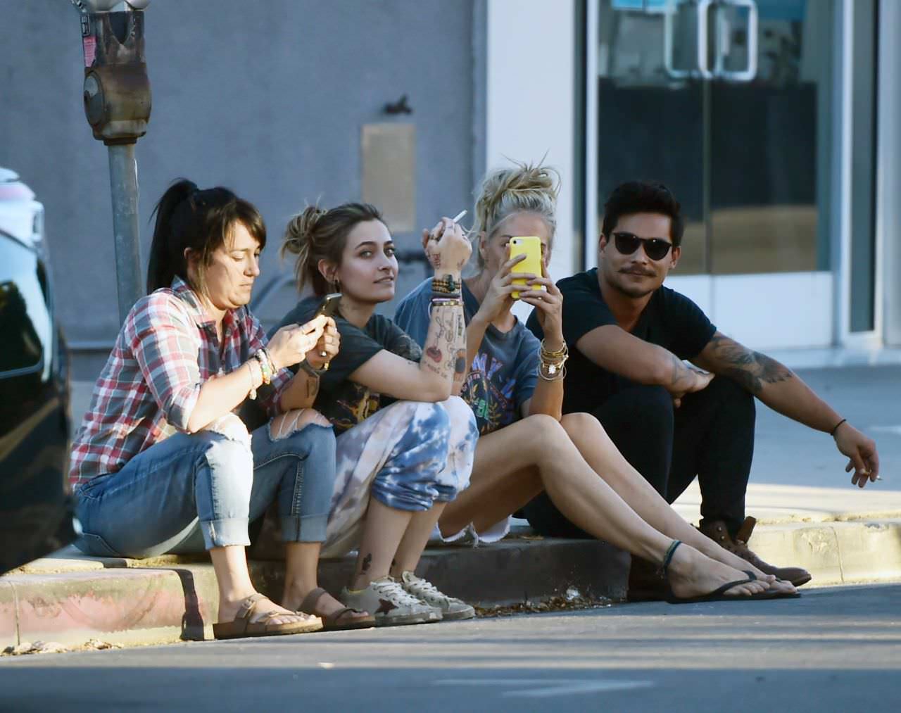 paris jackson in a peace sign t shirt as she smokes with friends 2