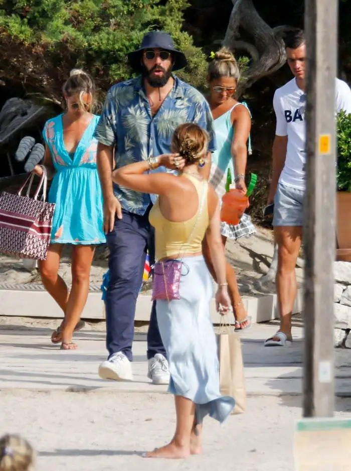 rita ora opts for a gold crop top as she walks with bf in ibiza 3