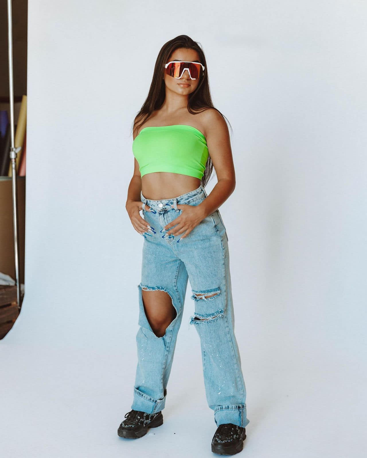 Tati McQuay Posing in Green Strapless Top and Jeans