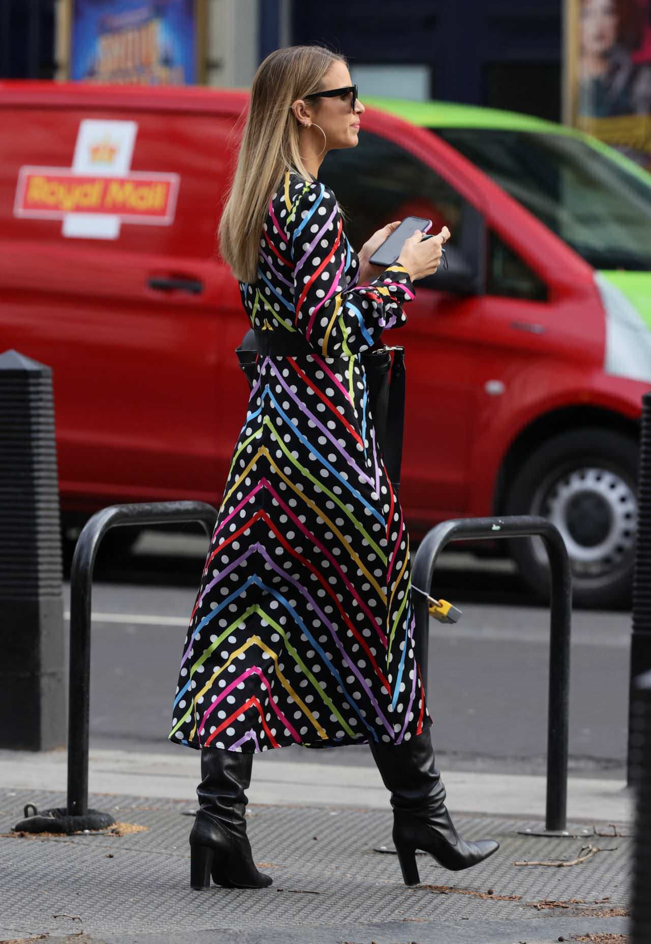 Vogue Williams Goes to Work in a Chic Polka Dot Striped Dress