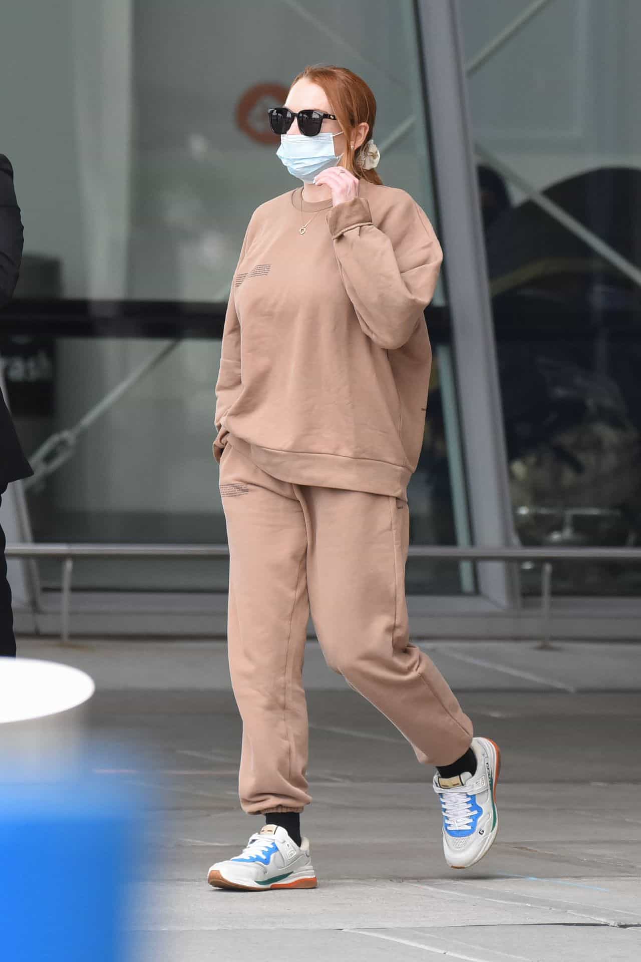 Lindsay Lohan in a Comfy Organic Sweatsuit at JFK Airport in New York