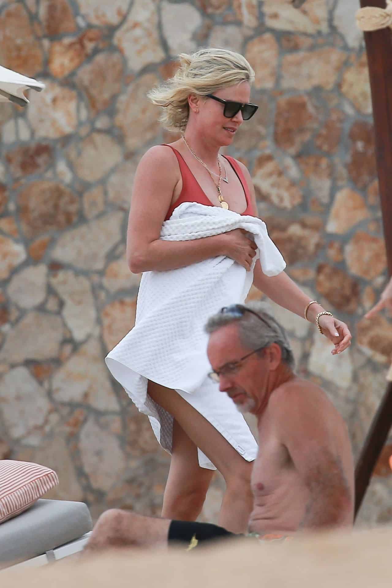 Charlize Theron Looked Amazing in a Red Swimsuit in Cabo San Lucas
