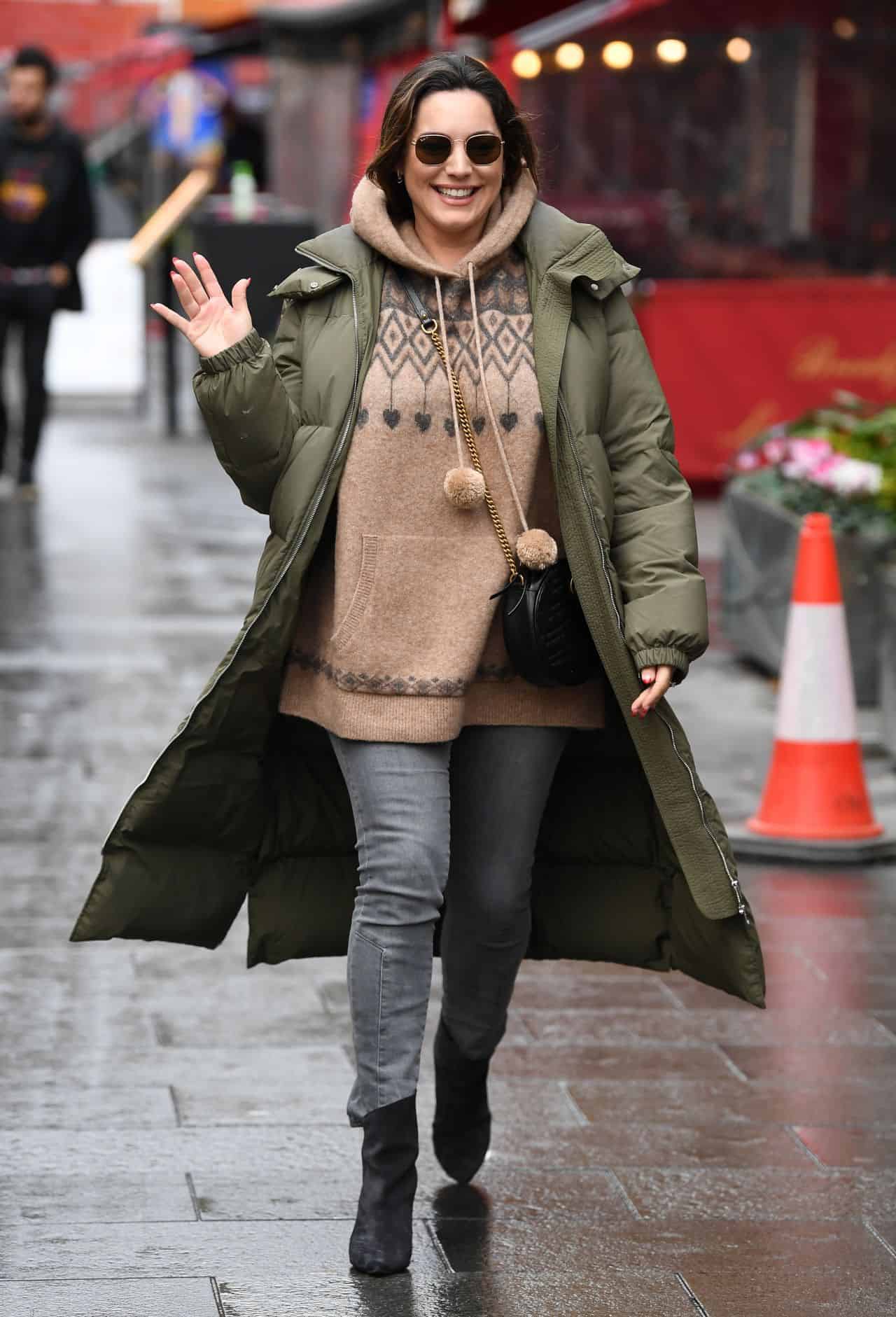Kelly Brook Looked Chic in a Festive Hoodie as she Arrived at Heart Radio