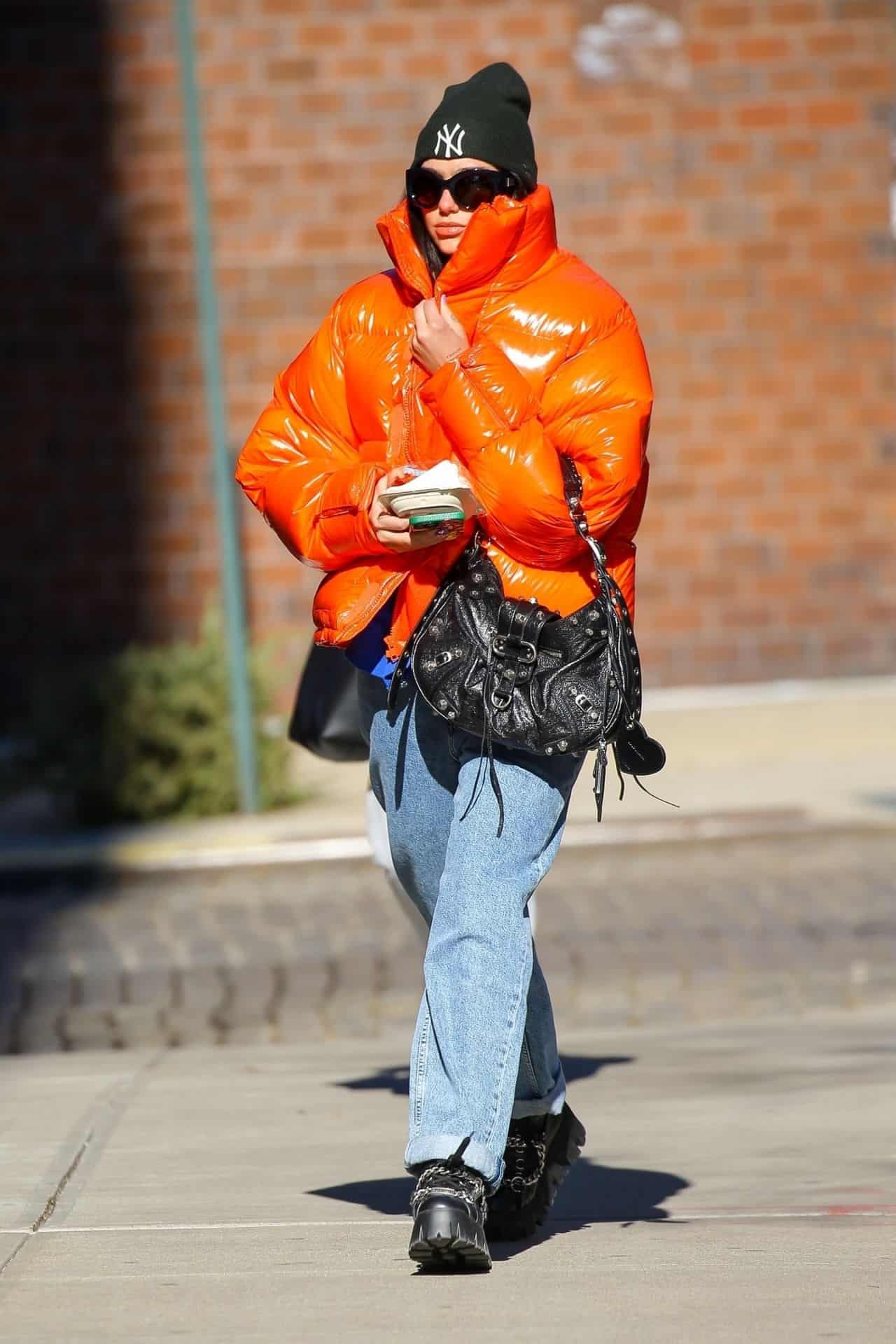 Dua Lipa Bundles Up in a Bright Orange Jacket as she Headed to the Gym