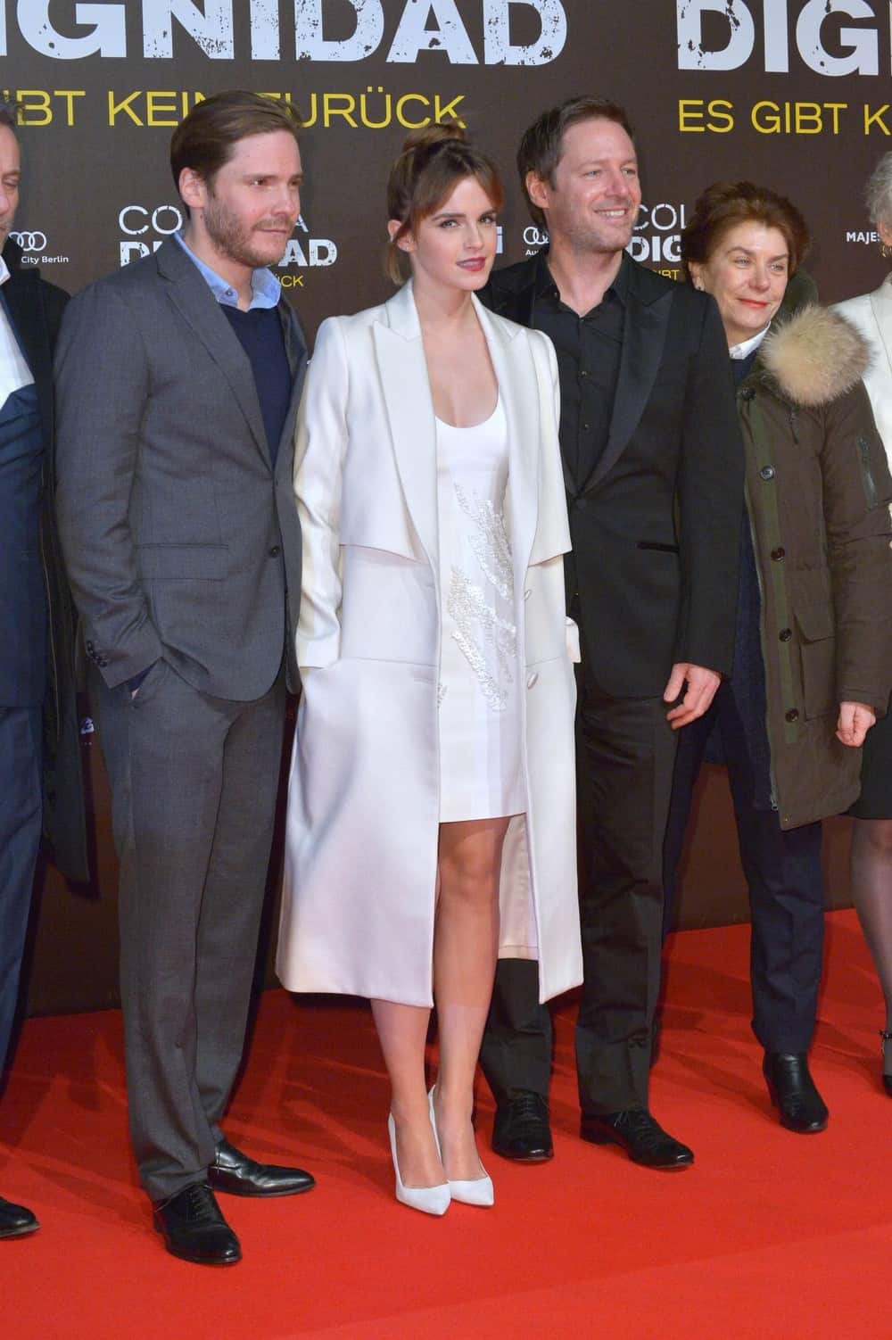 Emma Watson in a Revealing White Dress at the Movie Premiere "Colonia"