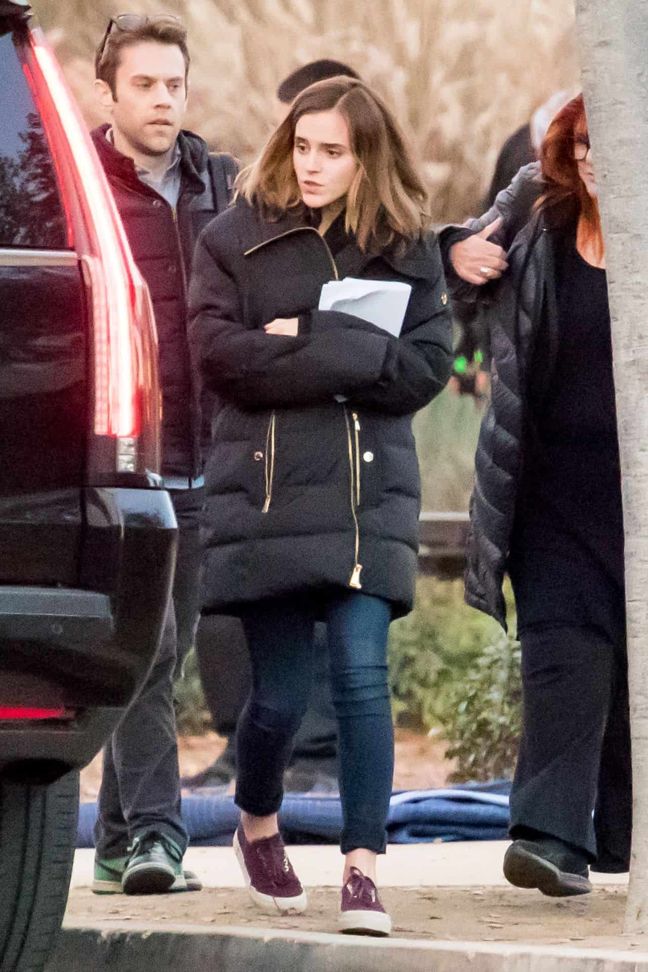 Emma Watson Stuns in a Blue Sweater and Jeans on the Set of “The Circle”
