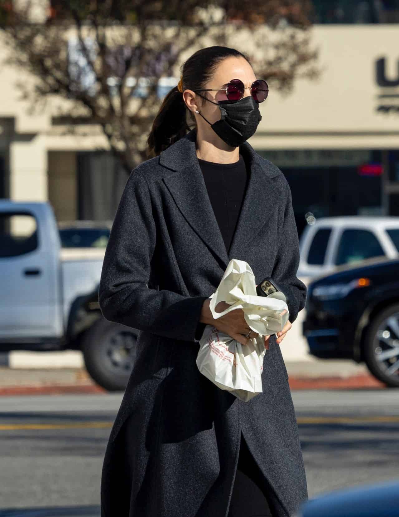 Gal Gadot Looked Stylish in a Dark Gray Coat when she Went Shopping in LA