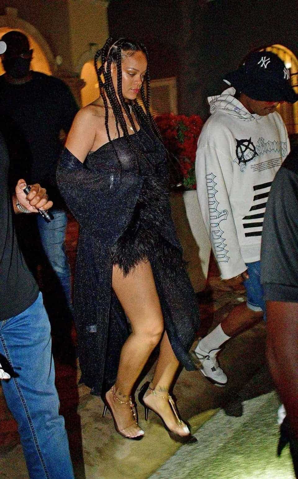 Rihanna Shines in a Black Gown Alongside ASAP Rocky at New Year’s Eve Party