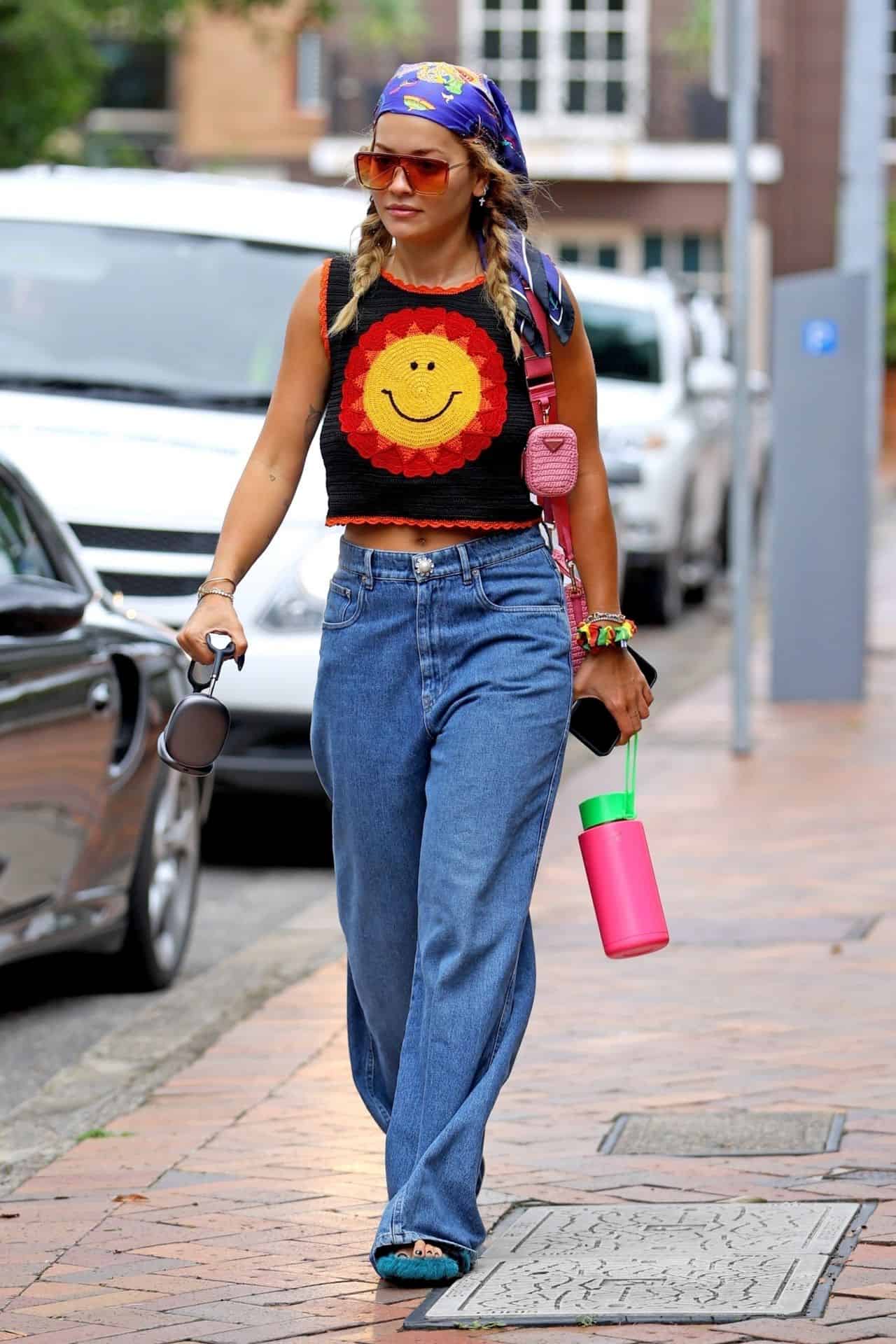 Rita Ora Wears a Crochet Crop Top and Pink Prada Crochet Bag in Sydney