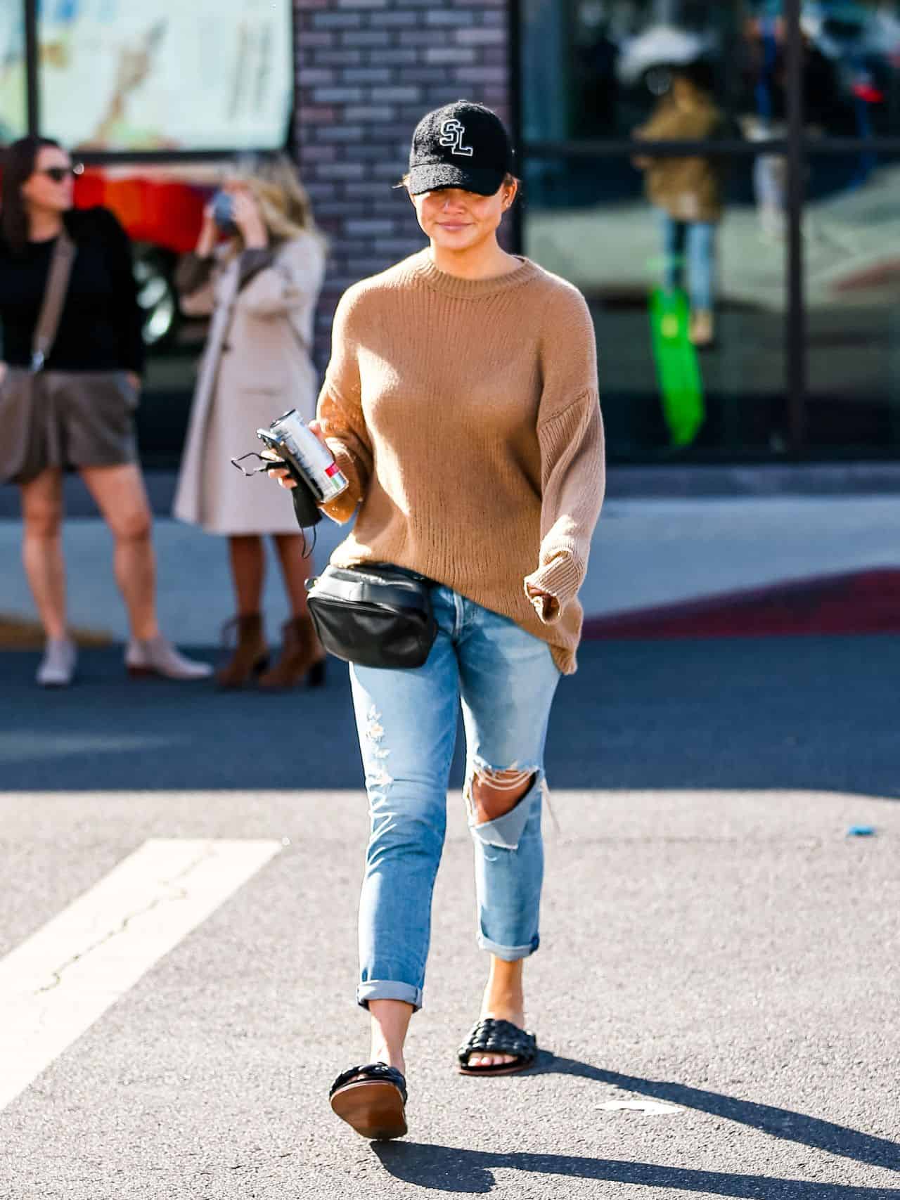 Chrissy Teigen Sported a Cozy Look for Shopping in a Luxury Store RealReal