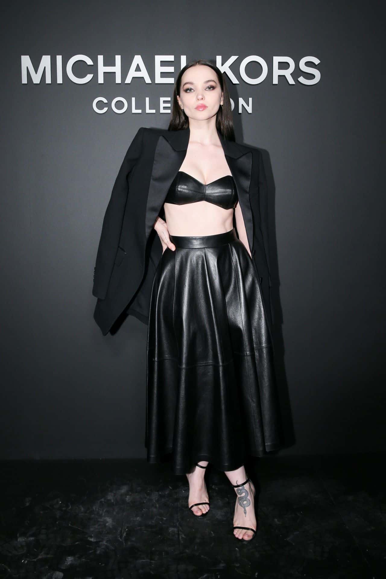 Dove Cameron Flaunts an Amazing Figure at the Michael Kors Show During NYFW
