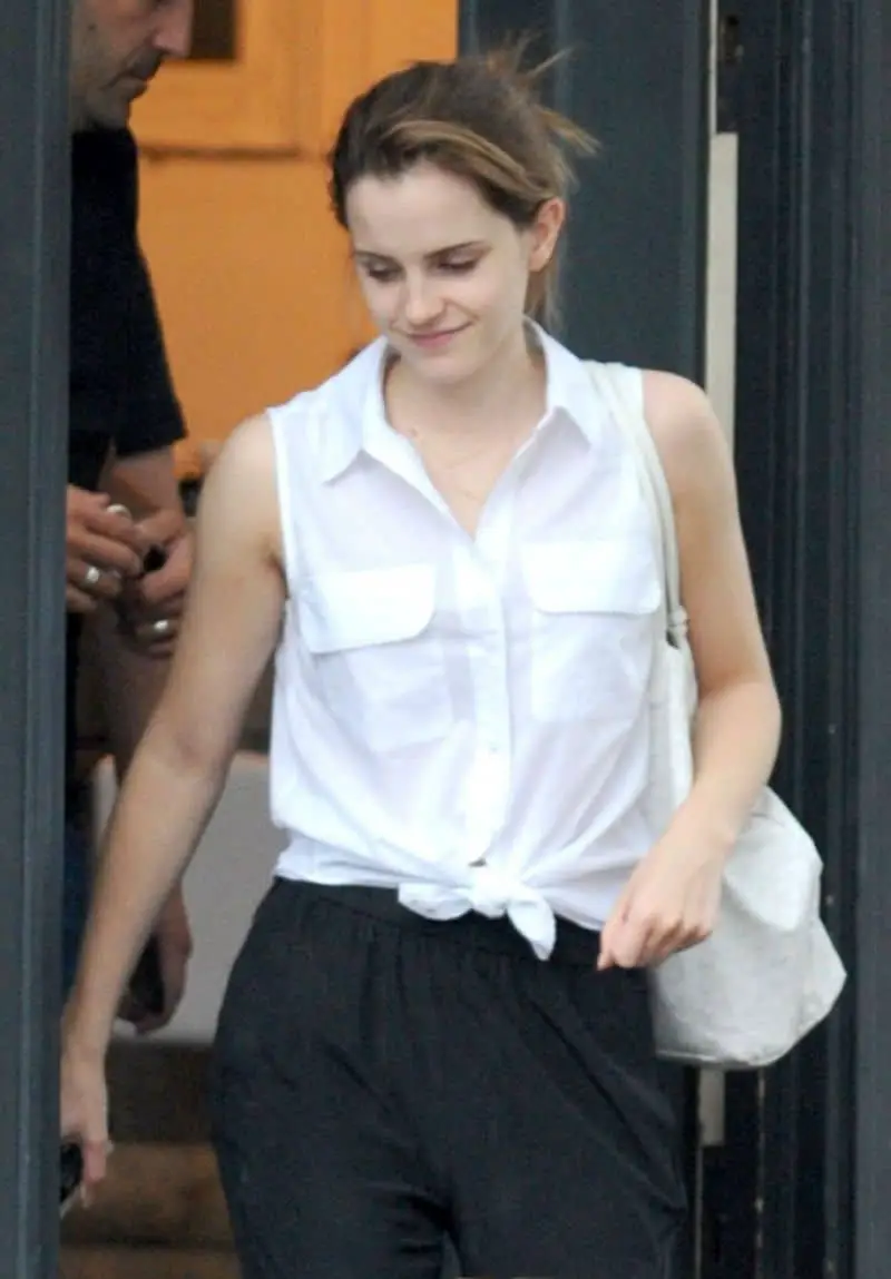 Emma Watson Looks Chic in a Sheer White Shirt at the Coffee Shop in London
