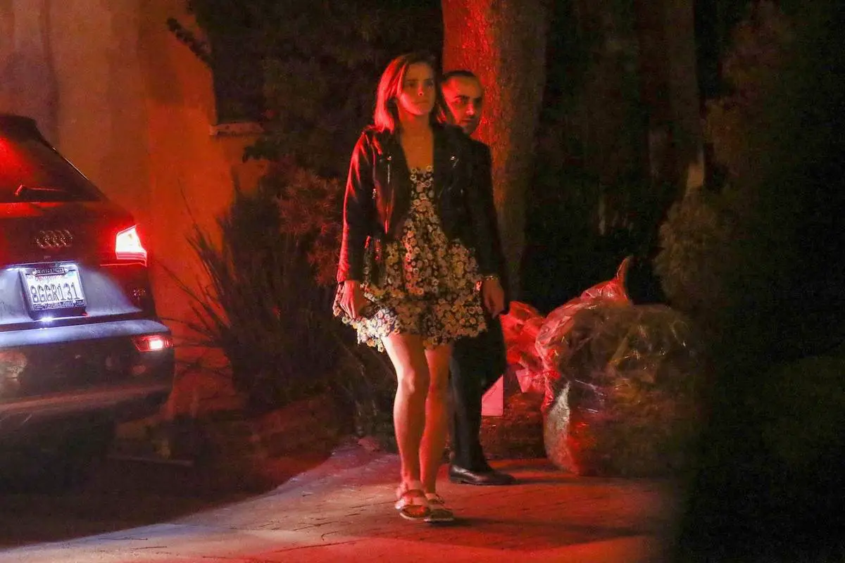 Emma Watson Looks Great in a Floral Mini Dress while she is Partying in LA