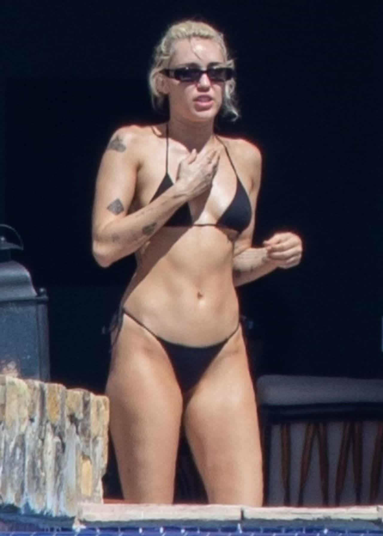 Miley Cyrus Turns Up the Heat in a Tiny Black Bikini by the Pool in Mexico