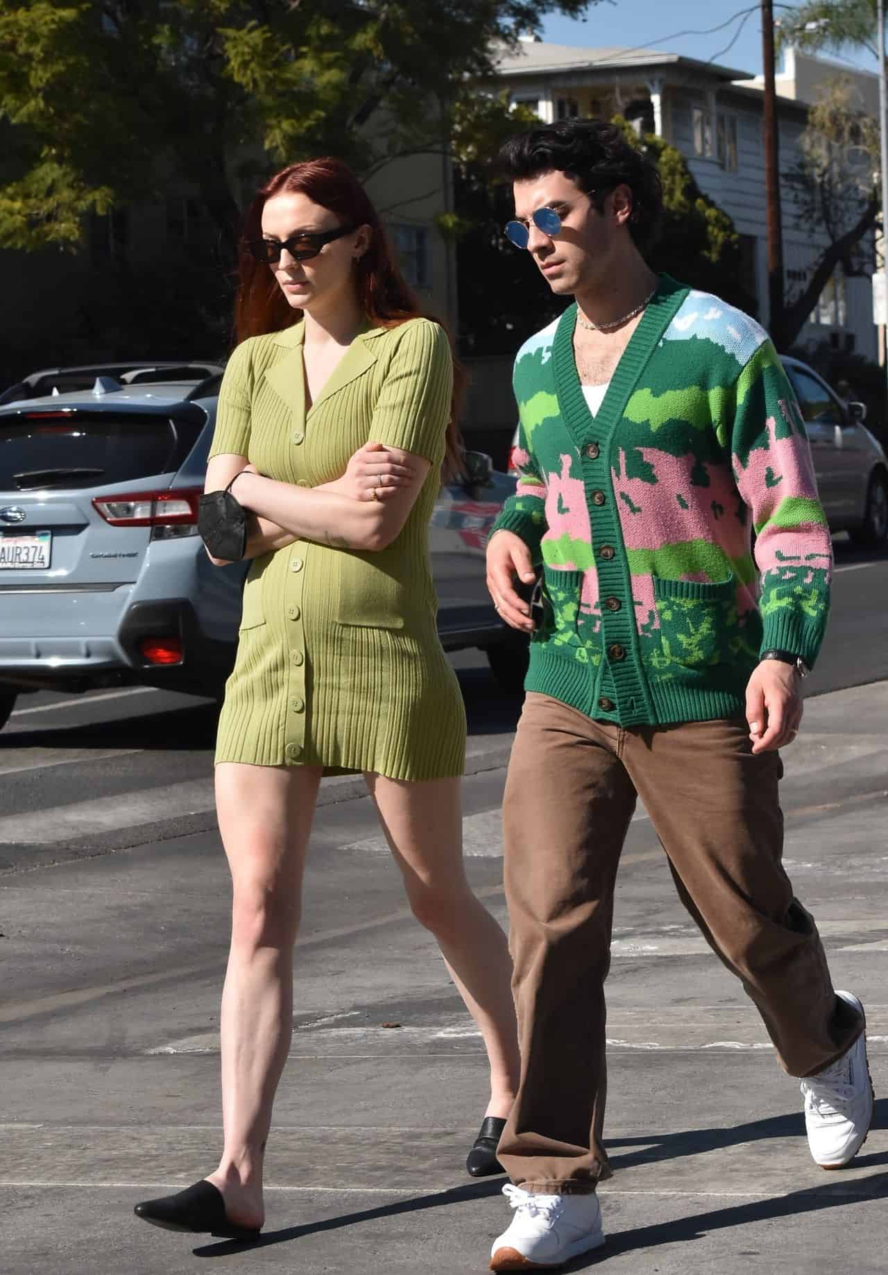 Sophie Turner Shows her Growing Baby Bump During an Outing with her Husband