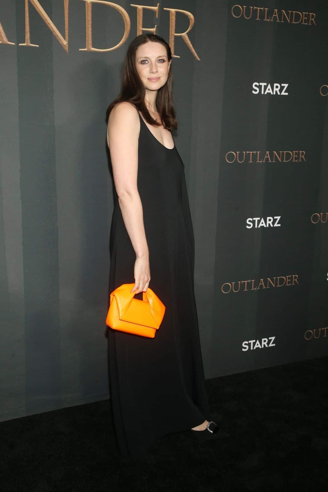 Caitriona Balfe Posed in a Black Dress at "Outlander" Season Six Premiere