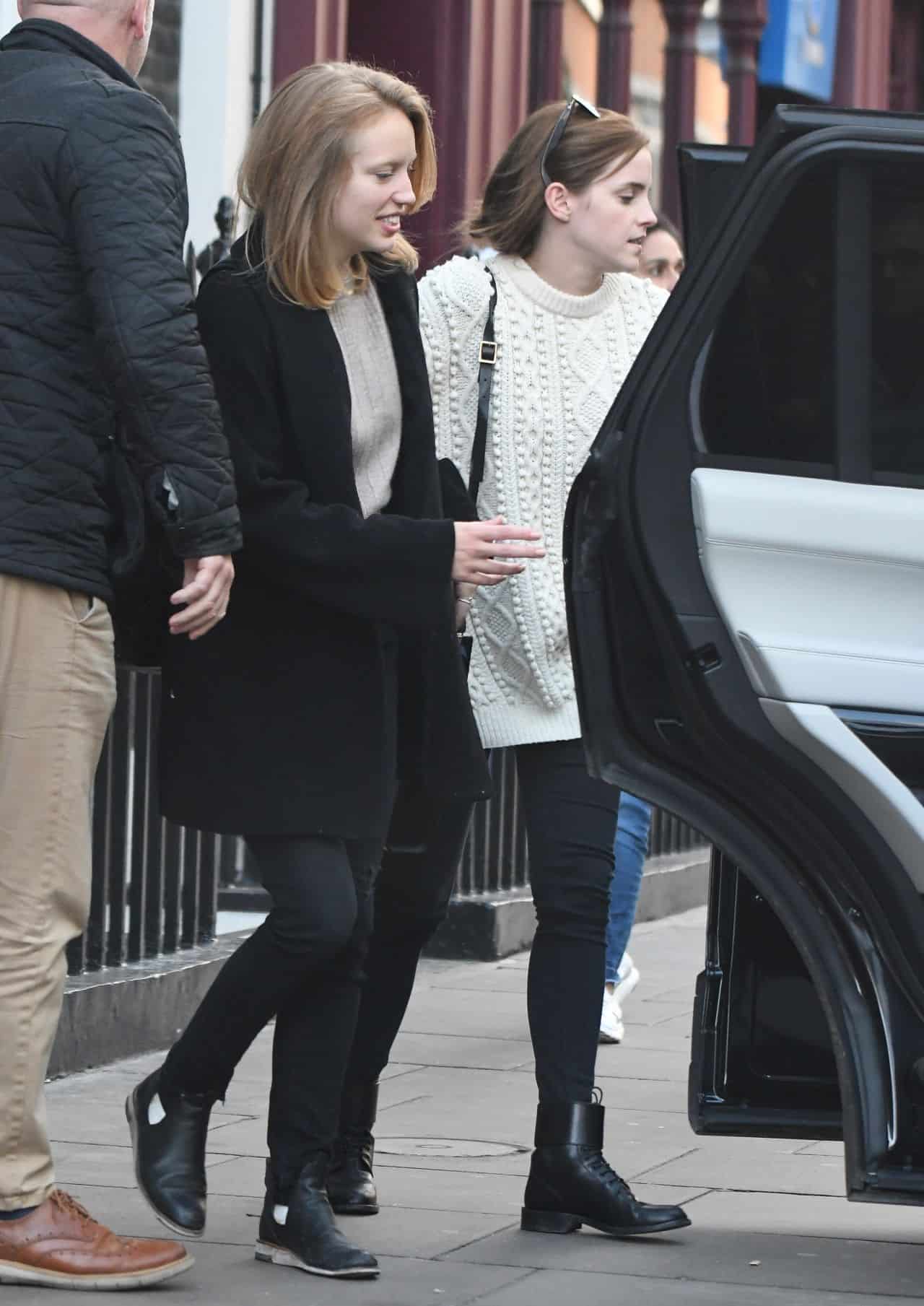 Emma Watson Looks Fantastic in a White Knitted Sweater and Black Jeans