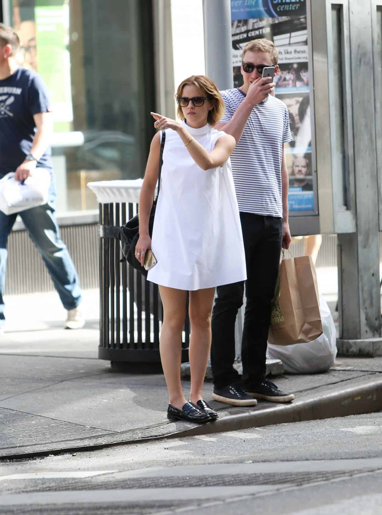 Emma Watson Shows Her Legs in a White Mini Dress as she Tours Shoe Stores