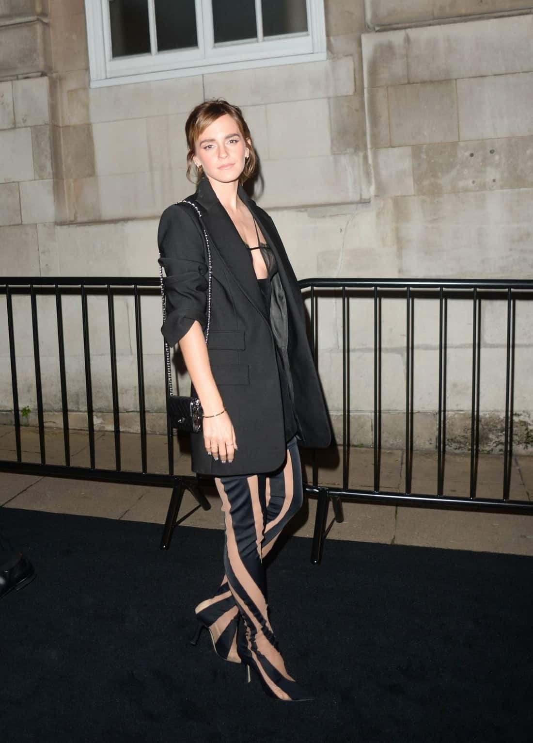 Emma Watson Wore Lace Bra and High Boots at Charles Finch X Chanel Pre-BAFTA Dinner In London 2022