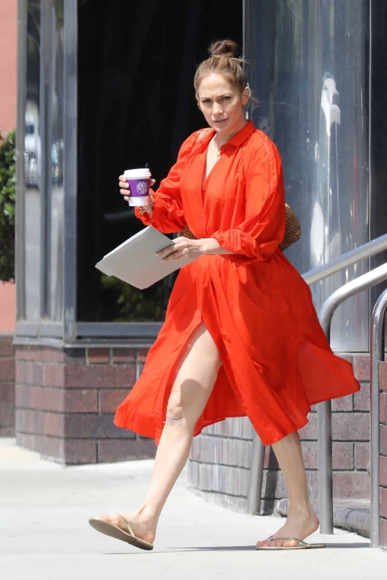 Jennifer Lopez Attended a Business Meeting in a Red Dress and Flip-flops