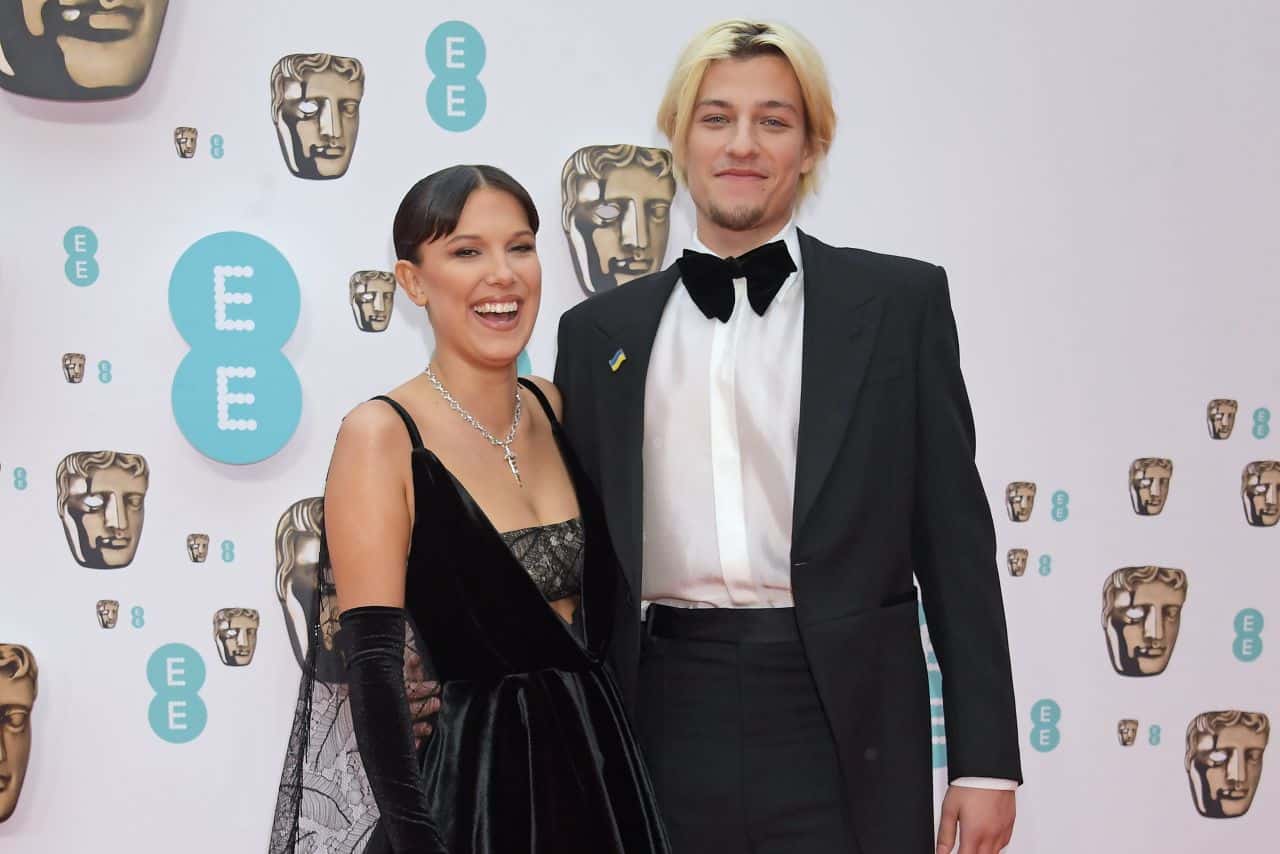 Millie Bobby Brown Rocks a Black Velvet and Lace Dress at EE BAFTAs 2022 with Boyfriend Jake Bongiovi