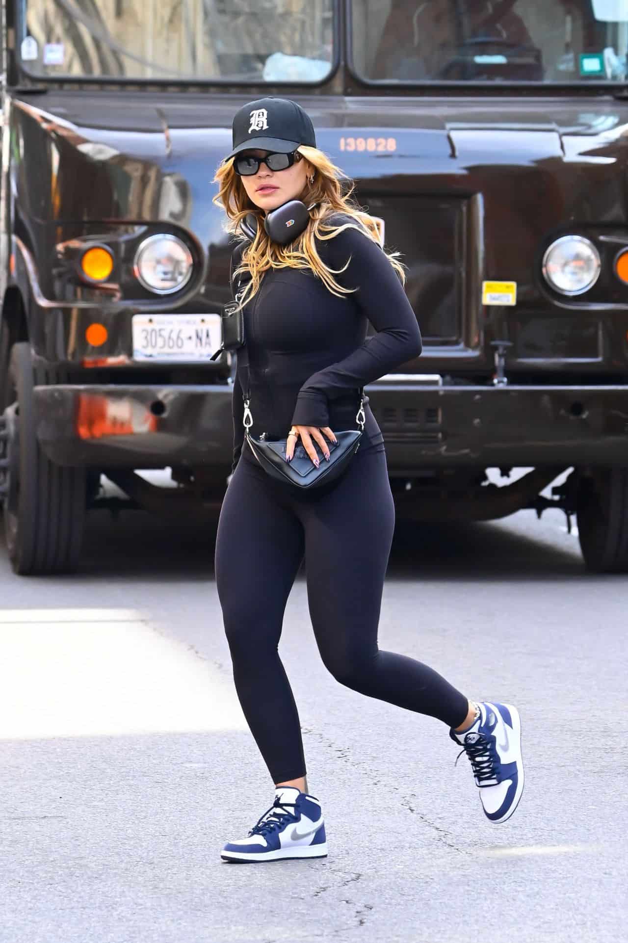 Rita Ora Looks Awesome in Black Tight Workout Gear and Prada Bag in NYC