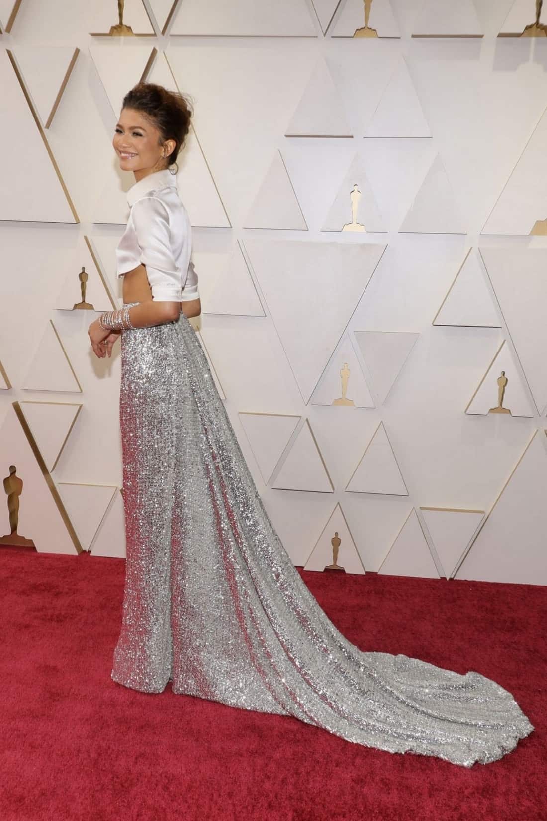 Zendaya Wows in a White Crop Top and Silver Sequin Skirt at the 2022 Oscars