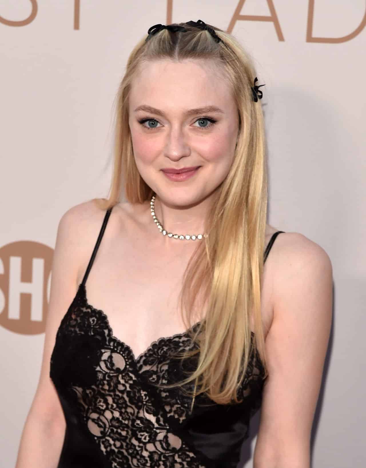 Dakota Fanning Wore a Black Sheer Dress at The First Lady Premiere in LA