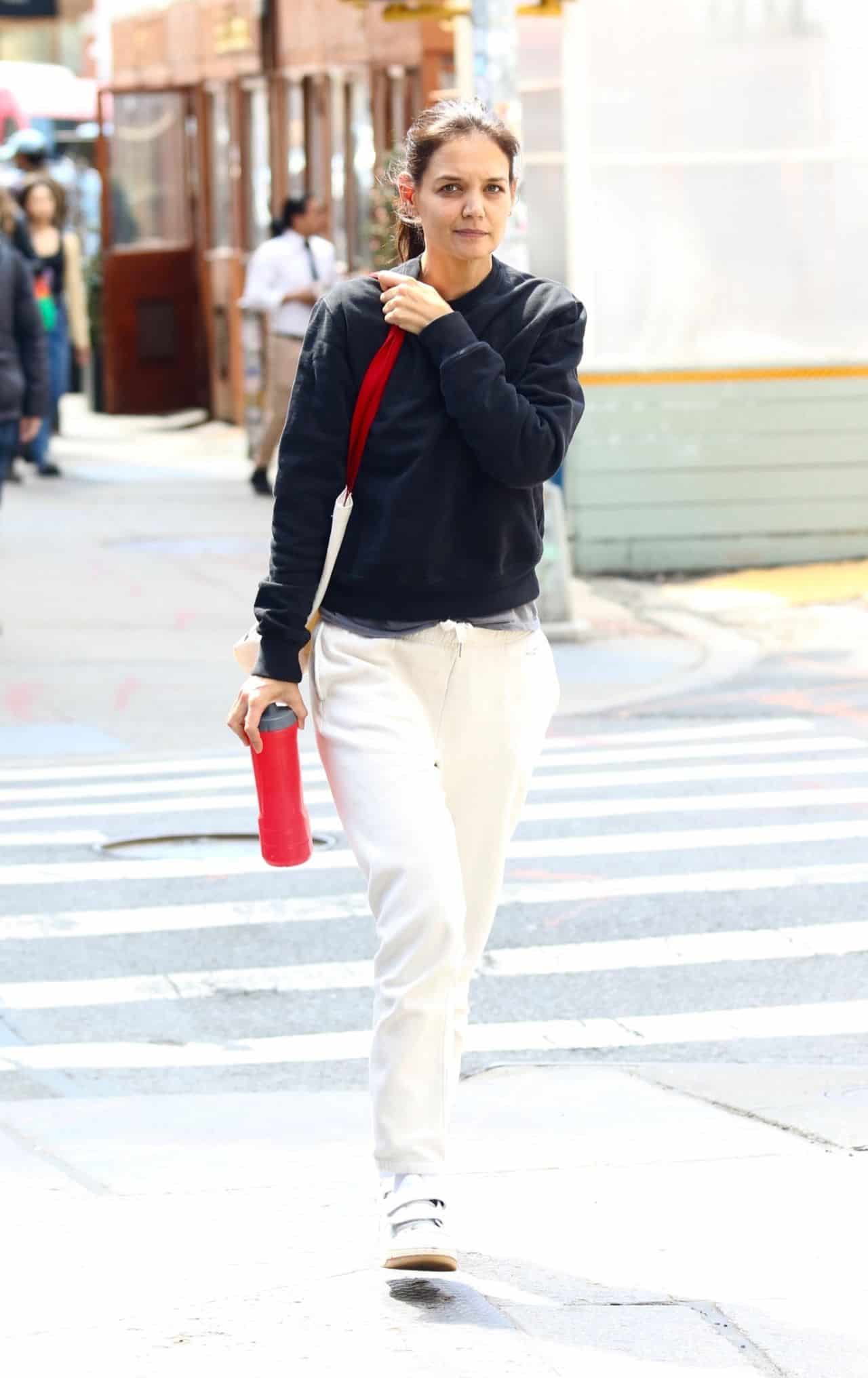 Katie Holmes Was Casual in White Sweatpants and was Makeup-free in NYC