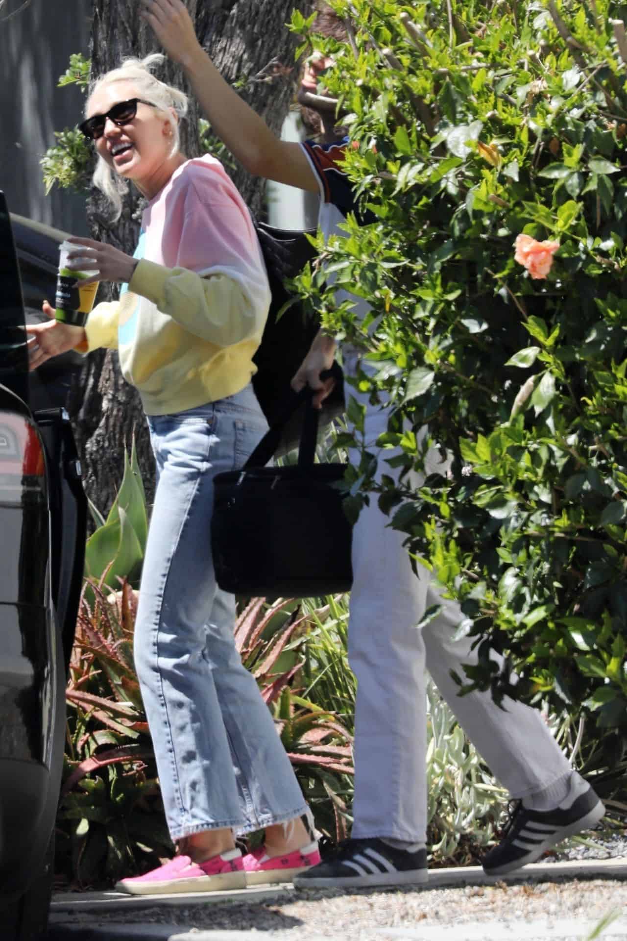 Miley Cyrus Rocks a Casual Look while Leaving the Studio with Maxx Morando
