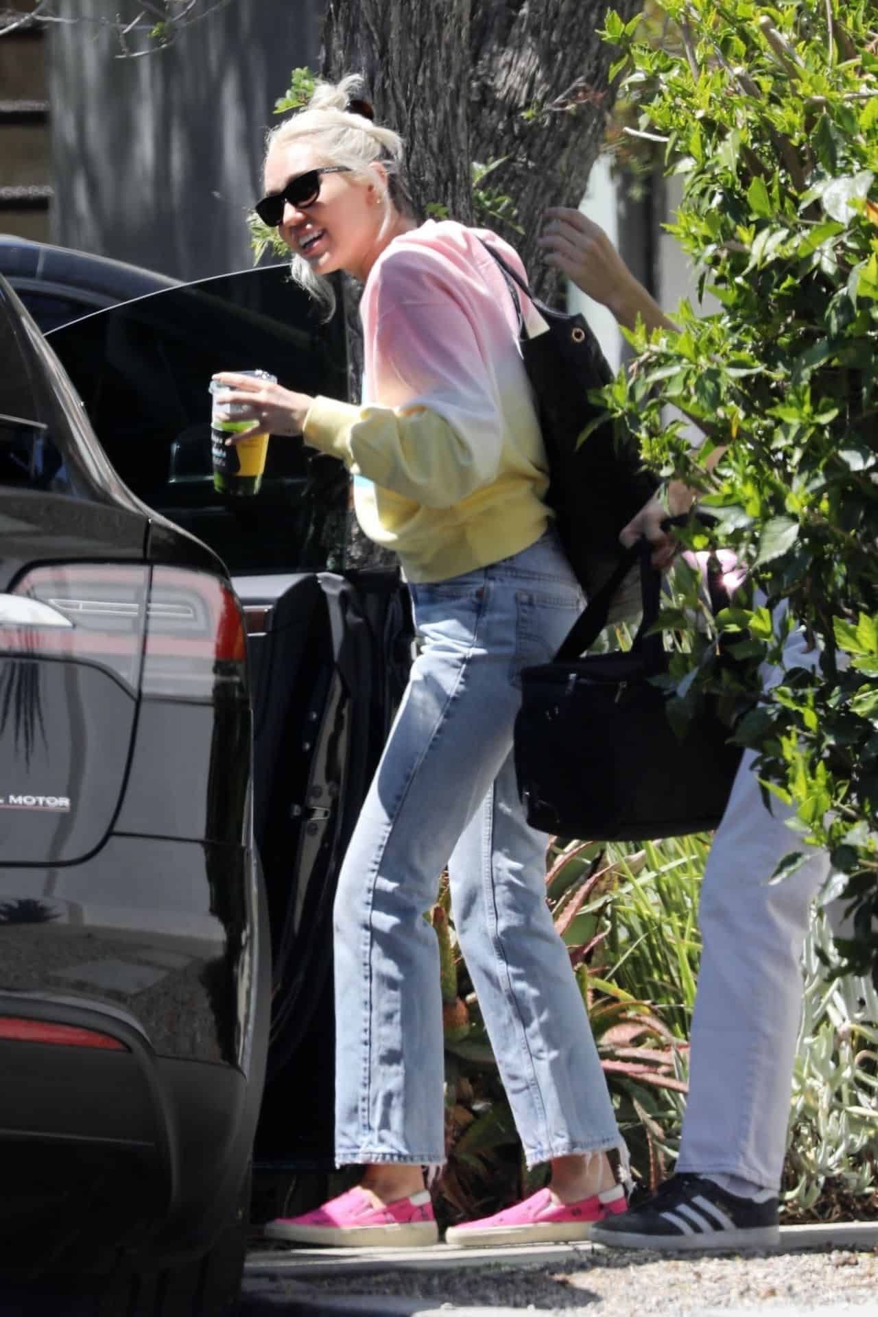 Miley Cyrus Rocks a Casual Look while Leaving the Studio with Maxx Morando