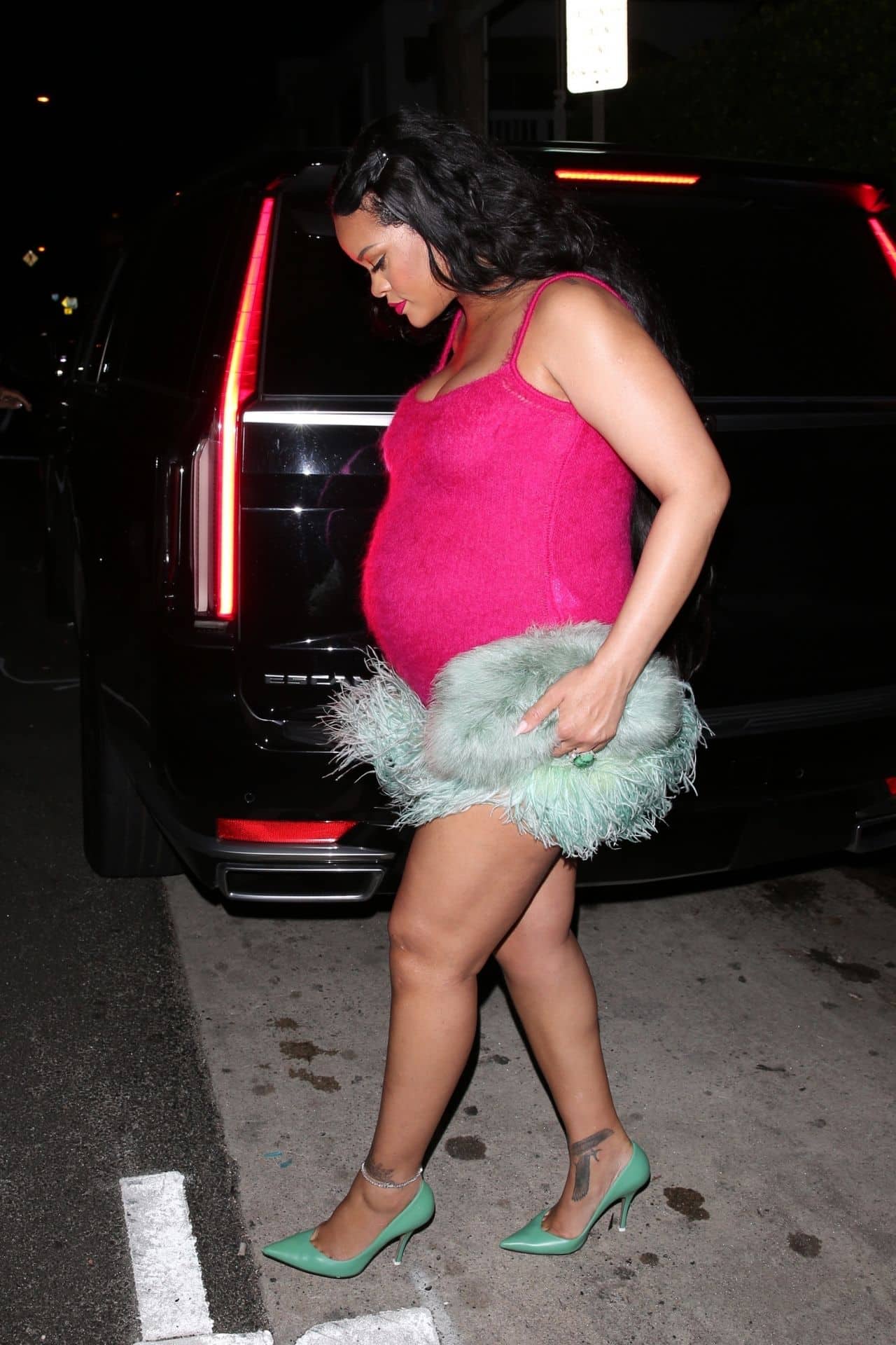 Rihanna Glowing in a Pink Fur-trimmed Mini Dress at Giorgio Baldi in LA